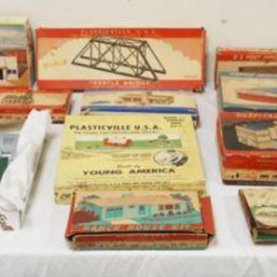 1296	LARGE SELECTION OF VINTAGE PLASTICVILLE HOUSES, BUILDING, ETC
