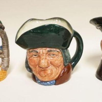 1011	3 ROYAL DOULTON TOBIES, ROBINSON CRUSOE, HENRY VIII, TOBY PHILPOTS, TALLEST APPROXIMATELY 8 IN
