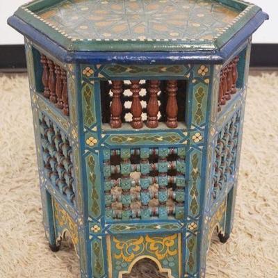 1141	POLYCHROME DECORATED MOORISH STAND, APPROXIMATELY 15 IN X 20 IN H
