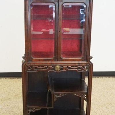 1125	ANTIQUE ASIAN CURIO CABINET WITH LOWER SHELF HAVING BEVELED GLASS DOOR AND SIDES, METAL MOUNTS AND PIERCED POGADA STYLE TOP,...