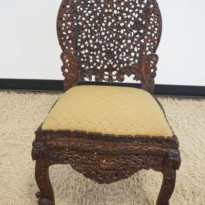 1122	ANTIQUE PIERCED AND FRETWORK CARVED ASIAN CHAIR, APPROXIMATELY 20 IN X 17 IN X 36 IN H, SOME LOSS TO CARVING
