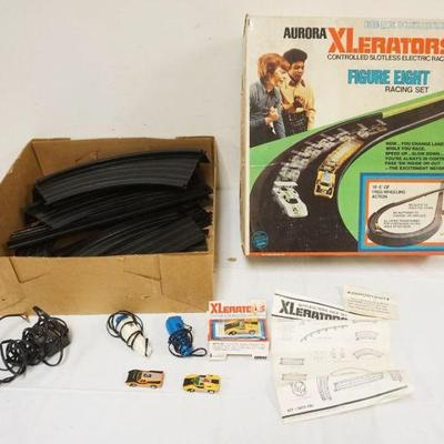 1297	AURORA HO GAUGE SLOT CAR SET XLERATORS 1974 W/3 CARS

