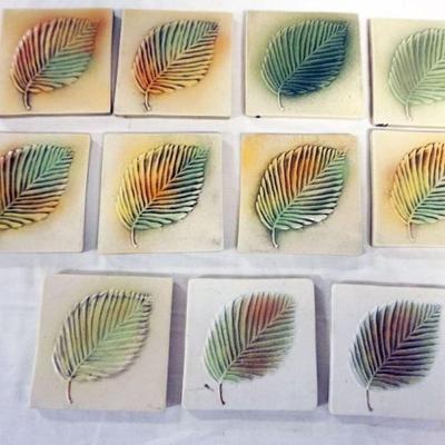 1067	NATALIE SURVING ARCHITECTURAL TILES, SURVING STUDIOS, LEAF TILES, EACH APPROXIMATELY 4 IN X 4 IN, 11 TILES
