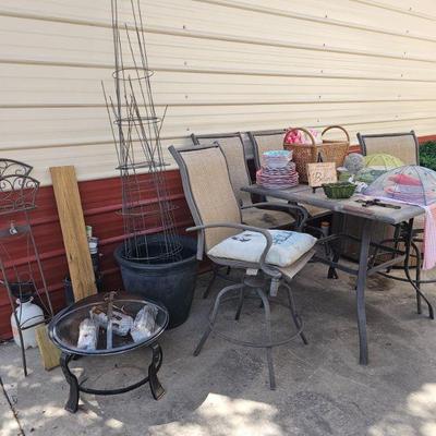 fire pit, tomato cages, patio table