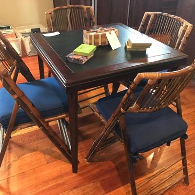 set pf 4 faux tortoise folding chairs $495
wooden card table $75
32 X 32 X 28"