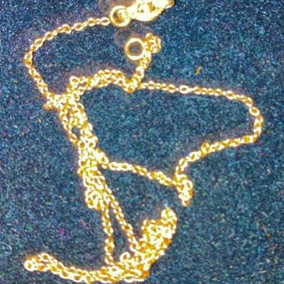 Delicate 10 Karat Gold Chain
16" in length, stamped 10K
