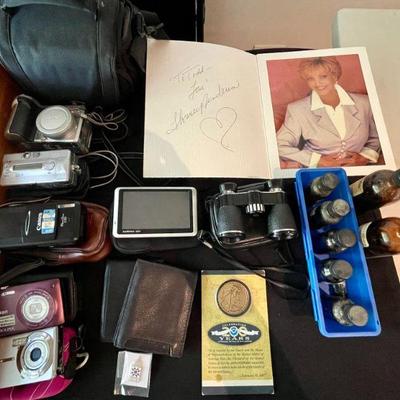 Digital cameras & signed picture of Mrs. Brady! 