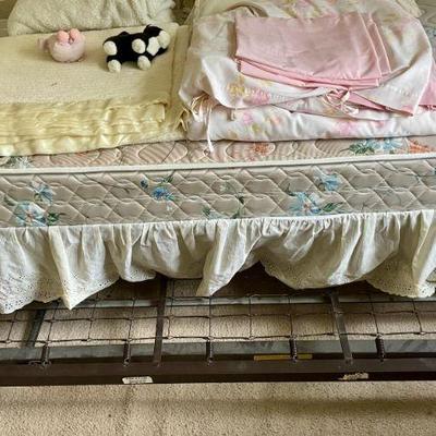 Trundle below (no mattress).