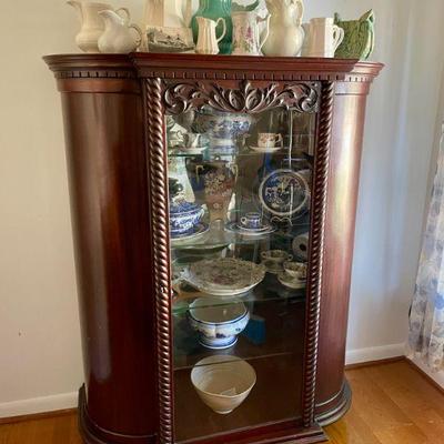 Antique carved china cabinet.