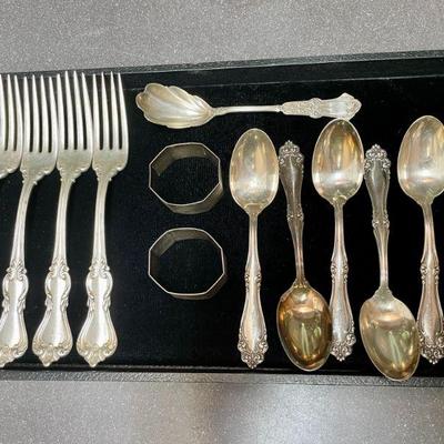 Sterling silver flaware pieces.