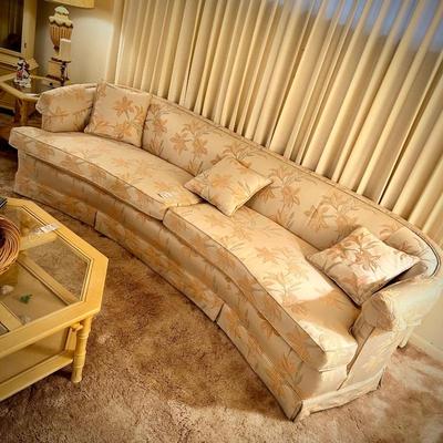 Curved vintage ivory sofa