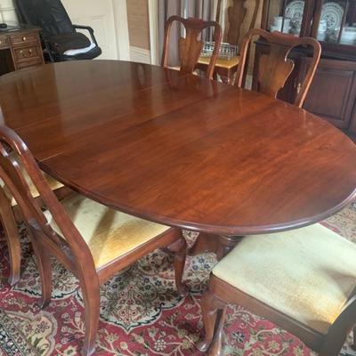 Cherry Statton QA style ext. table w/ set of six chairs, full set of table pads