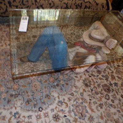 The area rug pictured was replaced with an Antique Area rug.