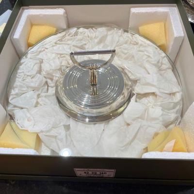 Lots of beautiful silver-plate serving pieces, including Christofle