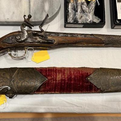 Antique Ottoman sword and antique Persian flint lock pistol