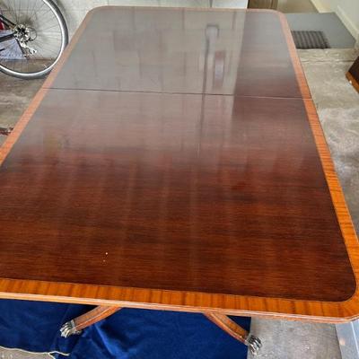 Rectangular dining table with 2 leaves, mahogany top with fruitwood marquetry border