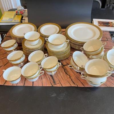Royal Worcester C1393 porcelain dinnerware
11 dinner plates
11 salad plates
11 dessert plates
12 cups and saucers
12 cream soups and saucers