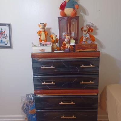 Black lacquer dresser and matching bedside chests and Tigger collection