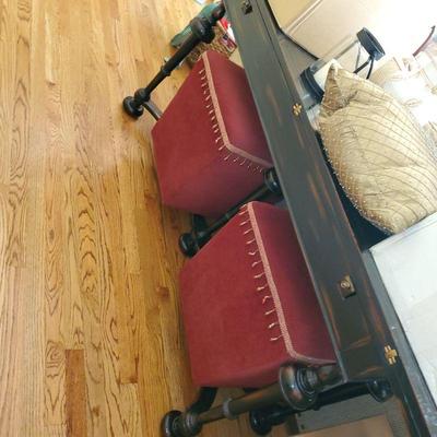 Red upholstered hassocks