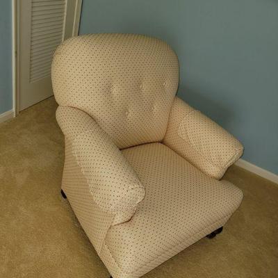 yellow overstuffed armchair