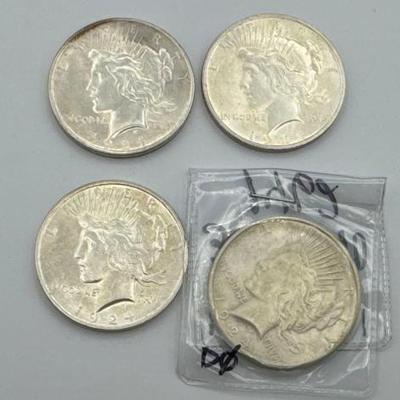 #378 • (4) 1924 Silver Peace Dollars
