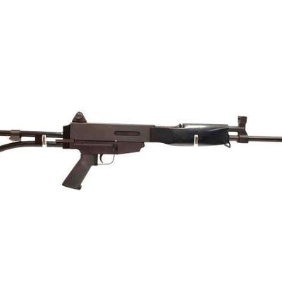 #1110 • Bushmaster Assault Rifle 5.56MM Semi-Auto Rifle
