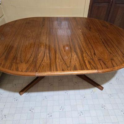 Mid Century Modern Teak Table has 3 chairs (need repair) shown with leaf insert