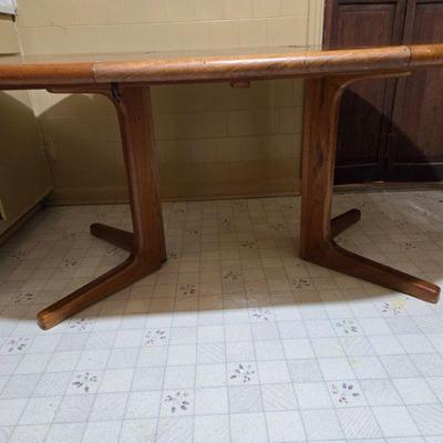 Mid Century Modern Teak Table has 3 chairs (need repair) shown with leaf insert