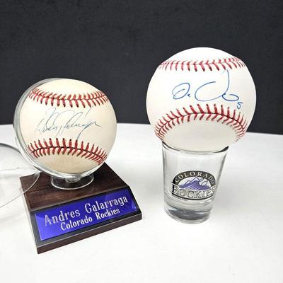 Lot #103 - Two Autographed Baseballs 1) Andres Galarraga and 2) Carlos Gonzales w/ COA