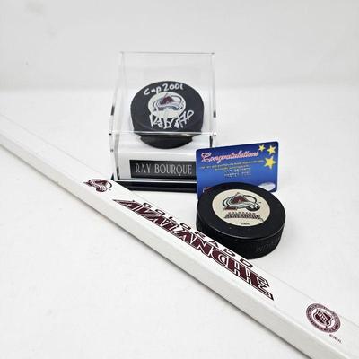Colorado Avalanche Hockey Stick and Autographed Puck by Ray Bourque in Display Case