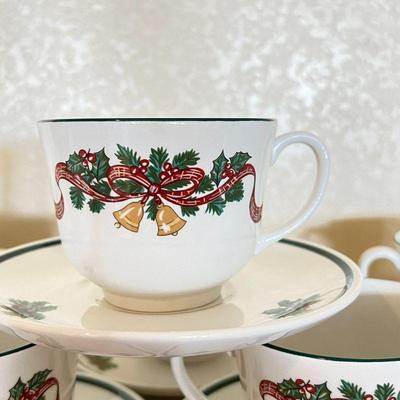 Christmas-themed teacups and saucers by Johnson Bros