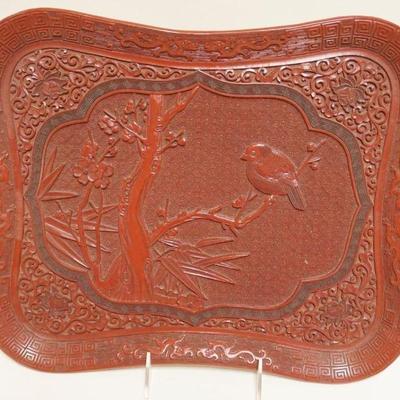 1064	CHINESE RED CINNABAR TRAY W/RELIEF IMAGE OF BIRD ON A BRANCH, APPROXIMATELY 12 IN X 14 IN

