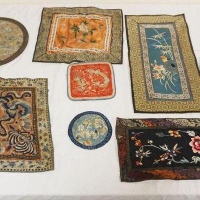 1282	GROUP OF ASSORTED ASIAN TEXTILES INCLUDING EMBROIDERED SILK, LARGEST PIECE APPROXIMATELY 9 IN X 17 IN
