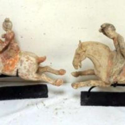 1184	CHINESE TERRACOTTA FIGURES OF ASIAN WARRIORS ON HORSES, EACH HAVING A METAL STAND, APPROXIMATEY 11 IN H
