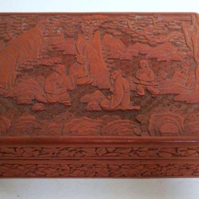 1066	CHINESE RED CINNABAR COVERED BOX, APPROXIMATELY 5 1/4 IN X 7 1/2 IN X 2 IN HIGH
