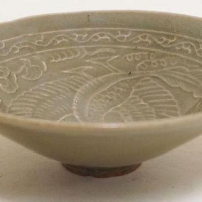 1033	ASIAN CELADON GLAZED BOWL W/IMAGE OF BIRD & VINES, APPROXIMATELY 6 IN X 2 IN HIGH
