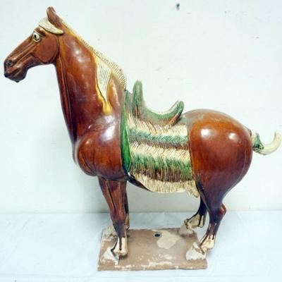 1191	CHINESE TERRACOTTA GLAZED FIGURE OF A HORSE, APPROXIMATELY 7 IN X 24 IN X 22 IN H
