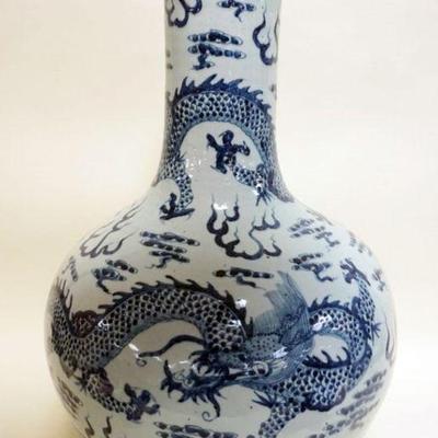 1119	LARGE CHINESE PORCELAIN BLUE AND WHITE VASE WITH IMAGES OF DRAGONS, APPROXIMATELY 24 IN H
