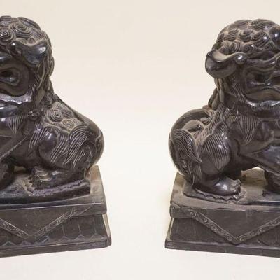 1056	PAIR OF CARVED STONE ASIAN FOO DOGS, EACH APPROXIMATELY 4 IN X 6 IN X 9 IN
