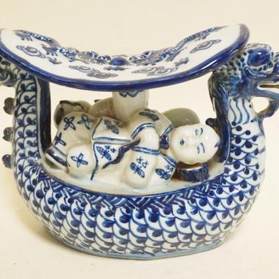 1043	ASIAN BLUE & WHITE PORCELAIN DRAGON PILLOW, CHARACTER MARKS ON BASE, APPROXIMATELY 9 IN X 4 IN X 6 IN
