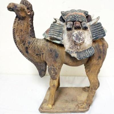 1187	CHINESE TERRACOTTA FIGURE OF CAMEL WITH REMOVABLE SADDLE, APPROXIMATELY 16 IN X 7 IN X 17 IN H
