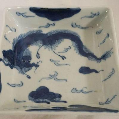 1261	ASIAN BLUE & WHITE PORCELAIN SQUARE BOWL W/IMAGES OF DRAGON, APPROXIMATELY 6 IN X 6 IN X 1/2 IN
