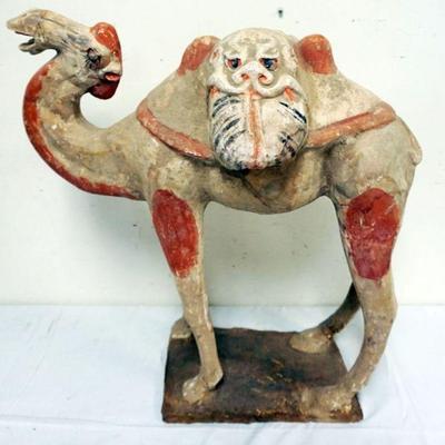 1190	CHINESE TERRACOTTA POLYCHROME DECORATED FIGURE OF A LARGE CAMEL, APPROXIMATELY 23 IN X 9 IN X 24 IN H
