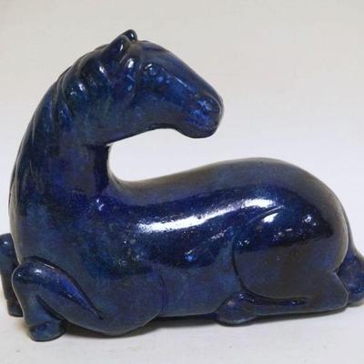 1054	ASIAN POTTERY BLUE GLAZED FIGURE OF A HORSE, APPROXIMATELY 8 IN X 3 IN X 6 IN
