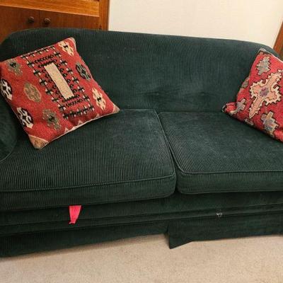 Love Seat/ Twin Bed. - The Pink Tape was used to tie down the bed when moving- It is actually a really nice couch!