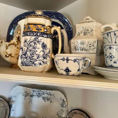 Assorted porcelain dishware and teapot collection
