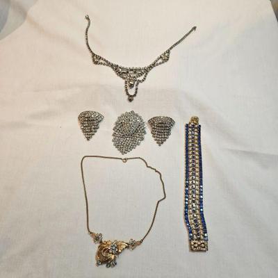 https://www.auctionninja.com/stress-free-estate-services-llc/sales/details/fine-gold-silver-and-costume-native-american-jewelry-coins-pap...