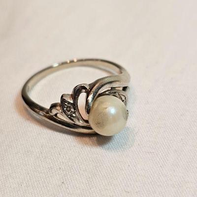 https://www.auctionninja.com/stress-free-estate-services-llc/sales/details/fine-gold-silver-and-costume-native-american-jewelry-coins-pap...
