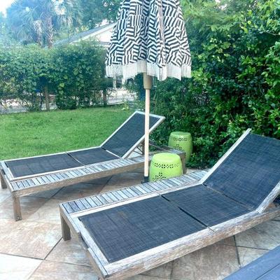 Lounge chairs and umbrella