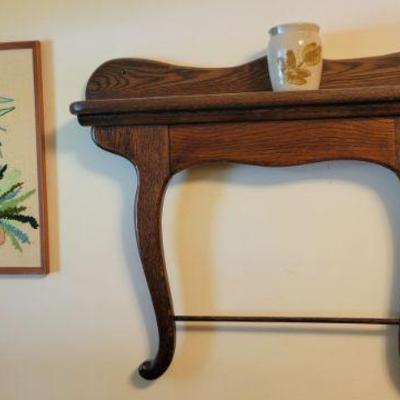 Dresser harp being used as a shelf 